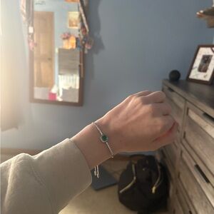 Elegant Silver Bracelet with Green Gem